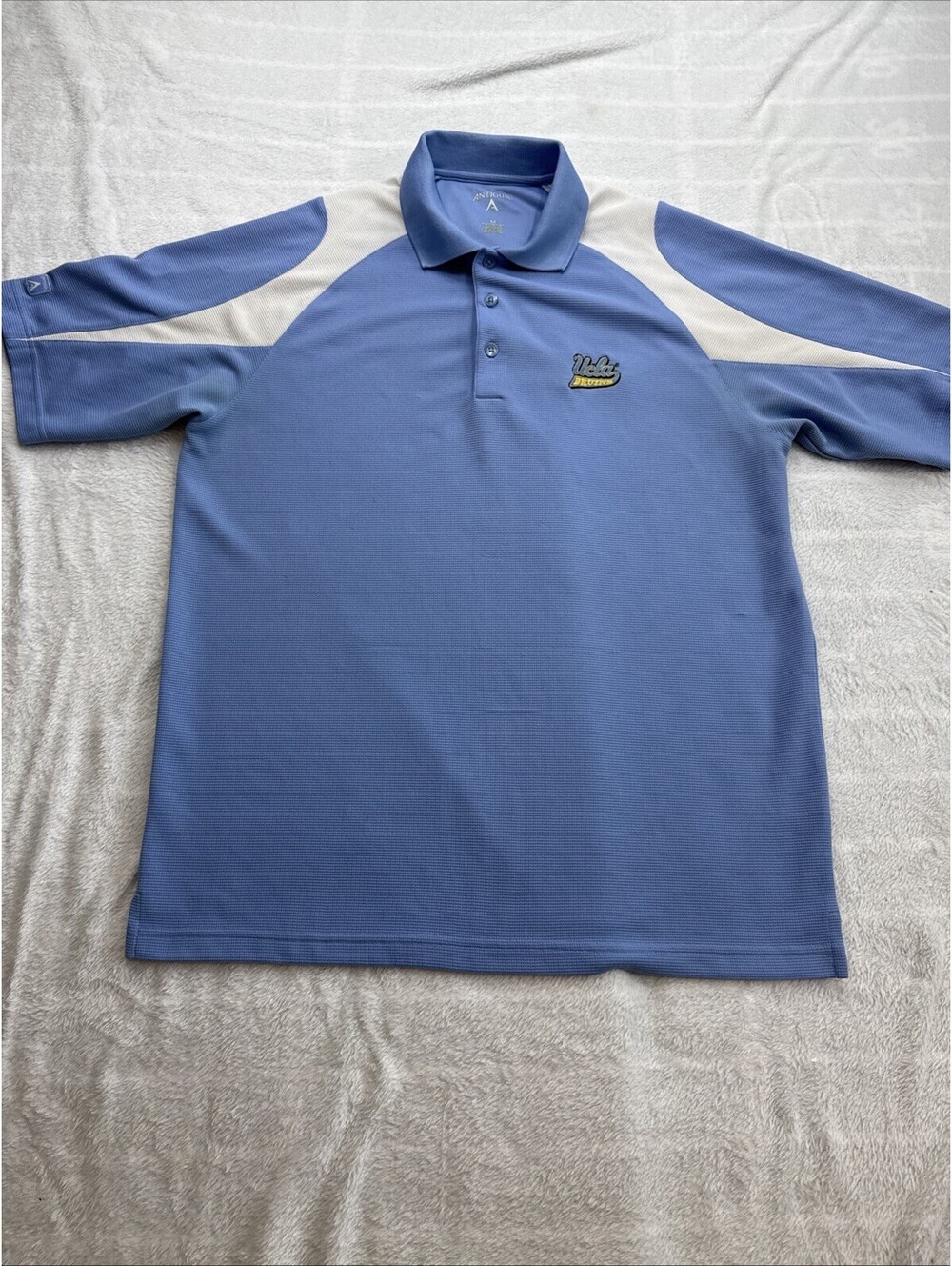 ANTIGUA GOLF SHIRT.. ...SIZE MEDIUM...LOGO: UCLA BRUINS (2448)